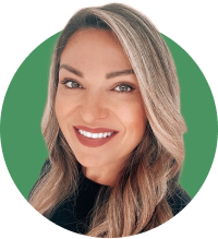 Headshot of Giovanna Reinking on a green background