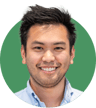 Headshot of Kevin Heung on a green background