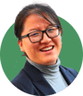 Headshot of Michelle Sun on a green background