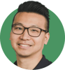 Headshot of Truman Tang on a green background
